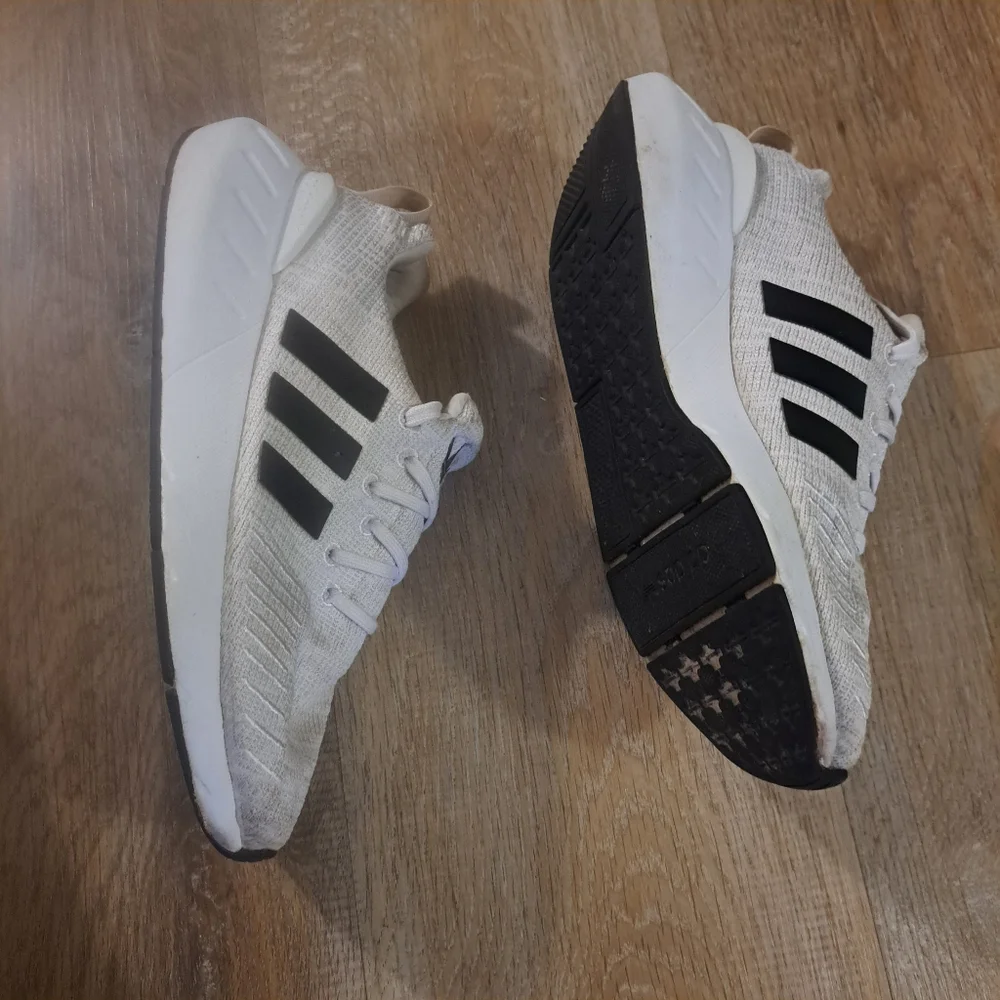 Adidas Kids' White Athletic Sneakers with Black Stripes